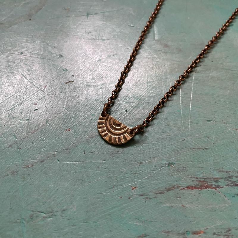 Tiny Brass "Sun-Bow" Necklace (upward facing, loose bow)