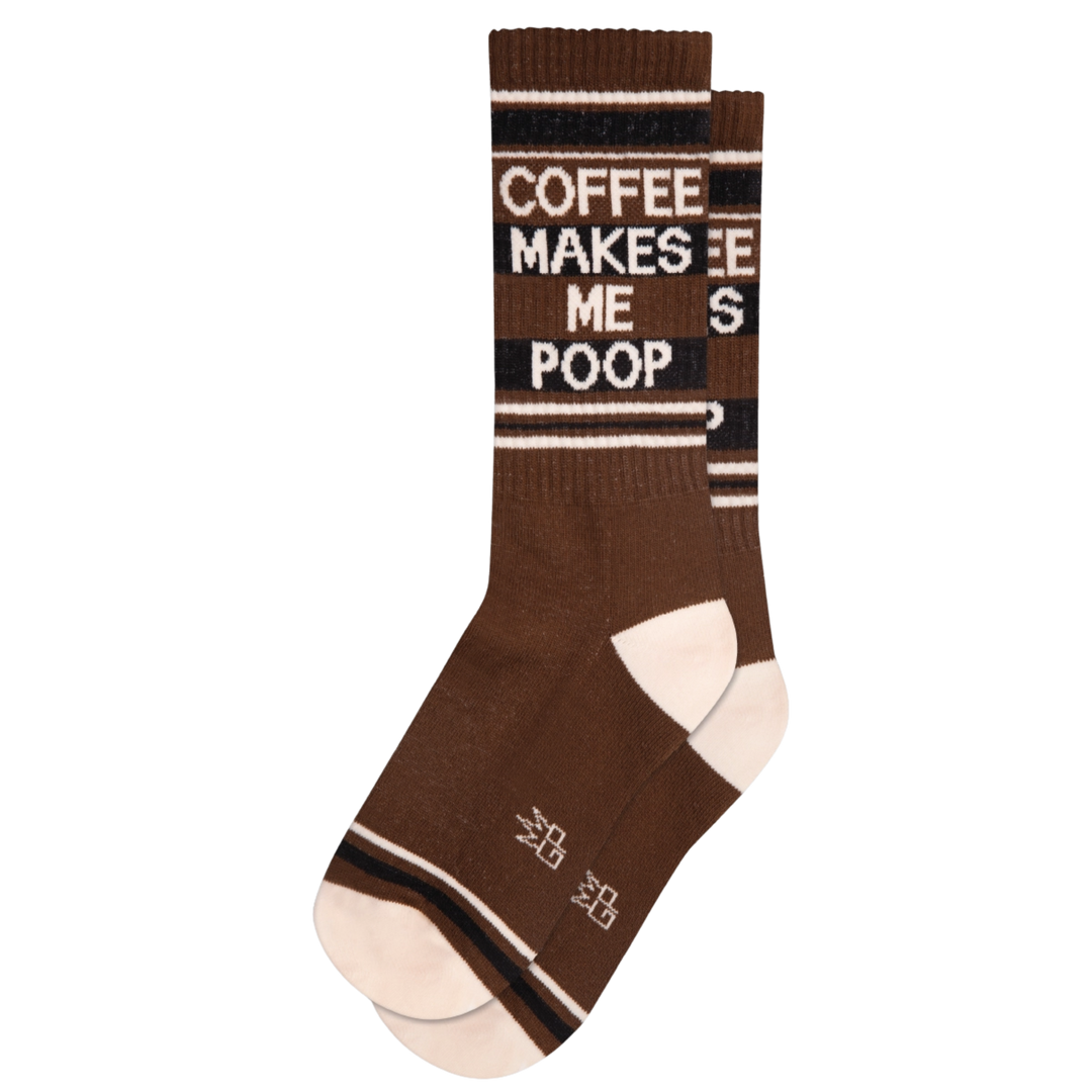Brown socks with black and white stripes and text "Coffee Makes Me Poop". Wake up your soul with a cup o' caffeine, get movin' and groovin', and watch the gears start to turn until your belly says 'whoa!'. Start your day off strong and, with this sock combo, you can be sure that you'll end up attending to more...well, important matters. 65% Cotton, 32% Nylon, 3% Spandex, built in the USA.